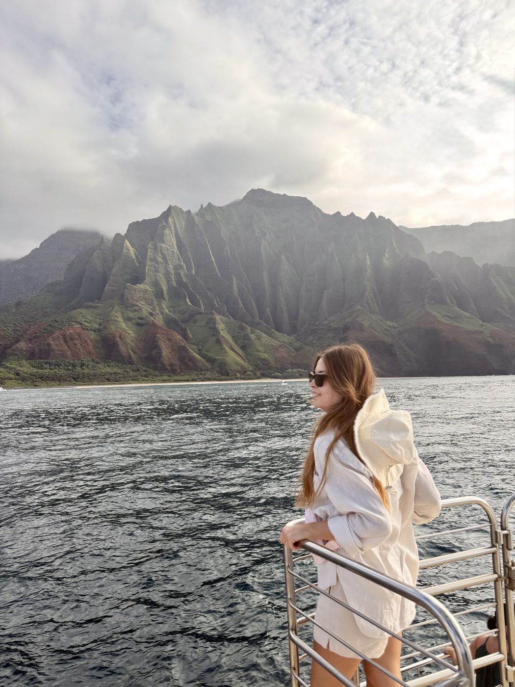 Zeynep on a boat along the Na Pali coast, Kauai