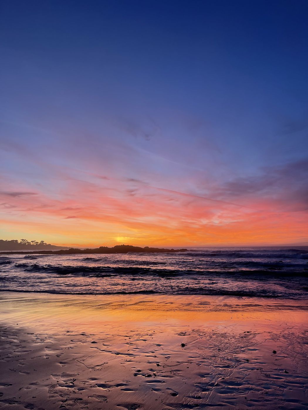 A vivid orange beach sunset